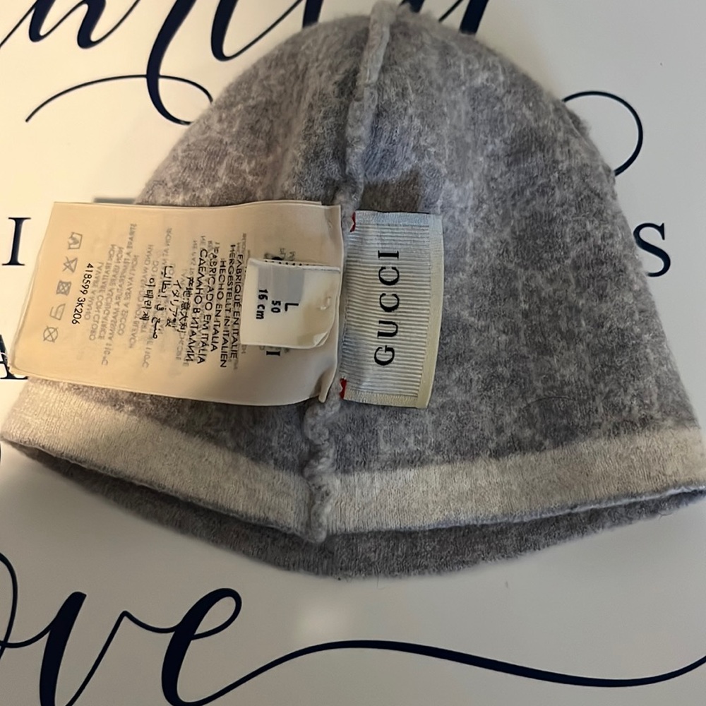Size large gray infant Gucci hat, (fits like a small)